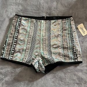 Forever 21 sequin shorts. Sz lg. New with tags